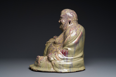 Tr&egrave;s grande figure de Bouddha en gr&egrave;s porcelaineux &agrave; &eacute;mail flamb&eacute; dite 'de Shiwan', 18/19&egrave;me