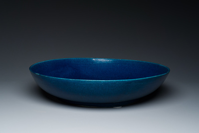 A very large Chinese monochrome blue-glazed dish, Kangxi
