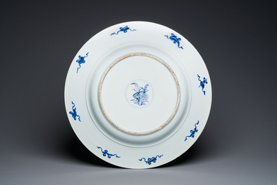 An exceptionally large Chinese blue and white 'peacock rim' dish, Kangxi