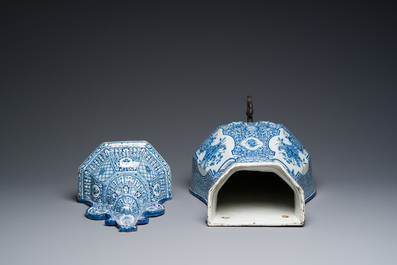 A massive Dutch Delft blue and white cistern and cover, 1st half 18th C.