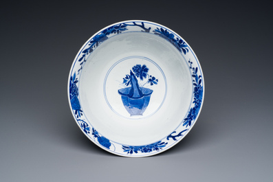 A Chinese blue and white bowl with floral 'four seasons' decoration, Chenghua mark, Kangxi