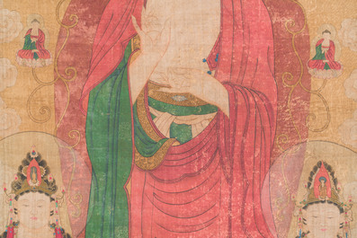 Chinese school: 'Buddha standing on two lotus flowers', ink and colour on silk, 18/19th C.