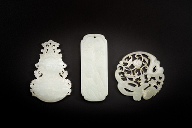 Three Chinese celadon and white jade pendants, Qing