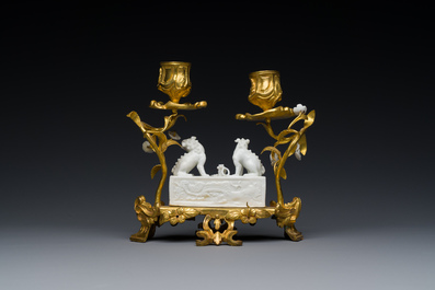 A Chinese Dehua blanc de Chine joss stick holder with French gilt bronze candlestick mounts, Kangxi and 18/19th C.