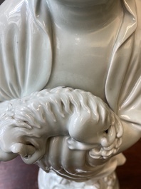 Two exceptionally tall Chinese white-glazed sculptures of Luohan, Qianlong/Jiaqing