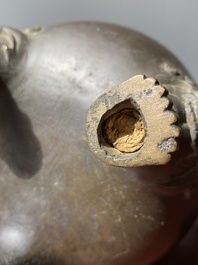 A Chinese bronze tripod censer with Liu Hai and the toad, Yuan