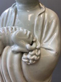 Two exceptionally tall Chinese white-glazed sculptures of Luohan, Qianlong/Jiaqing