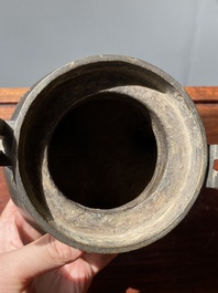 A Chinese bronze tripod censer with Liu Hai and the toad, Yuan