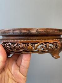 A Chinese famille verte vase with reticulated wooden cover and stand, Kangxi