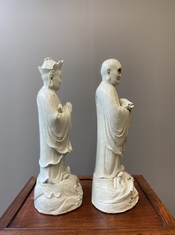 Two exceptionally tall Chinese white-glazed sculptures of Luohan, Qianlong/Jiaqing