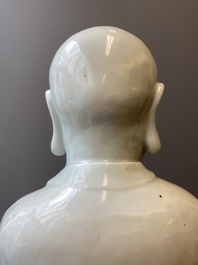 Two exceptionally tall Chinese white-glazed sculptures of Luohan, Qianlong/Jiaqing