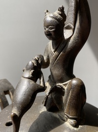 A Chinese bronze tripod censer with Liu Hai and the toad, Yuan