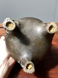 A Chinese bronze tripod censer with Liu Hai and the toad, Yuan