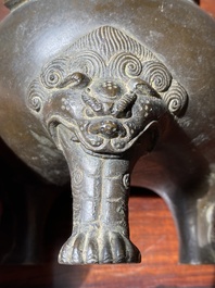 A Chinese bronze tripod censer with Liu Hai and the toad, Yuan