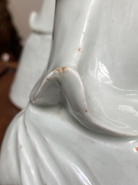 Two exceptionally tall Chinese white-glazed sculptures of Luohan, Qianlong/Jiaqing