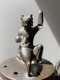 A Chinese bronze tripod censer with Liu Hai and the toad, Yuan