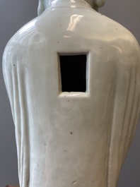 Two exceptionally tall Chinese white-glazed sculptures of Luohan, Qianlong/Jiaqing
