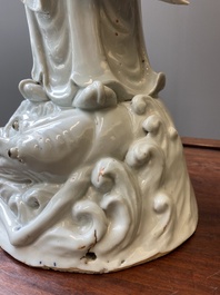 Two exceptionally tall Chinese white-glazed sculptures of Luohan, Qianlong/Jiaqing