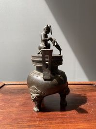 A Chinese bronze tripod censer with Liu Hai and the toad, Yuan