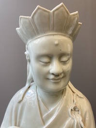 Two exceptionally tall Chinese white-glazed sculptures of Luohan, Qianlong/Jiaqing