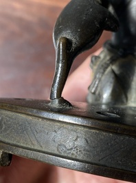 A Chinese bronze tripod censer with Liu Hai and the toad, Yuan