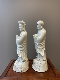 Two exceptionally tall Chinese white-glazed sculptures of Luohan, Qianlong/Jiaqing