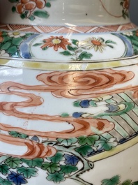 A Chinese famille verte vase with reticulated wooden cover and stand, Kangxi