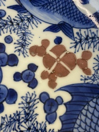 A Chinese blue, white and copper red 'crab and fish' dish, Kangxi
