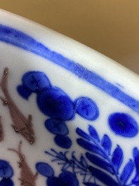 A Chinese blue, white and copper red 'crab and fish' dish, Kangxi