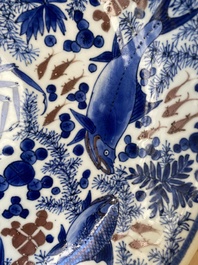 A Chinese blue, white and copper red 'crab and fish' dish, Kangxi