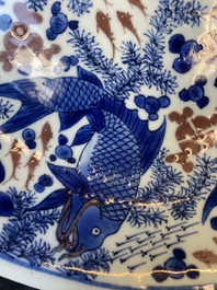 A Chinese blue, white and copper red 'crab and fish' dish, Kangxi