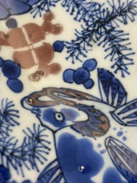 A Chinese blue, white and copper red 'crab and fish' dish, Kangxi