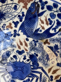 A Chinese blue, white and copper red 'crab and fish' dish, Kangxi