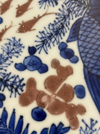 A Chinese blue, white and copper red 'crab and fish' dish, Kangxi