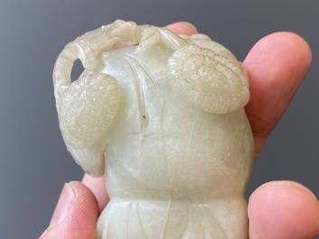 Two Chinese white and celadon jade carved standing boys, Qing