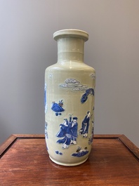 A Chinese celadon-ground blue, white and copper-red rouleau vase, Kangxi