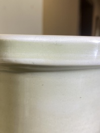 A Chinese celadon-ground blue, white and copper-red rouleau vase, Kangxi
