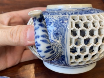 A pair of Chinese reticulated and double-walled blue and white teapots, Transitional period