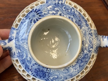A pair of Chinese reticulated and double-walled blue and white teapots, Transitional period