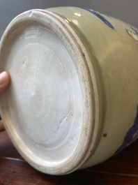 A Chinese celadon-ground blue, white and copper-red rouleau vase, Kangxi