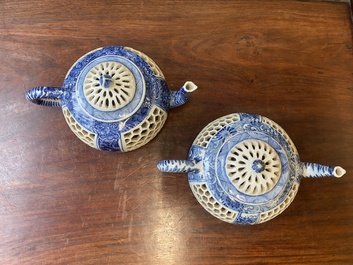 A pair of Chinese reticulated and double-walled blue and white teapots, Transitional period