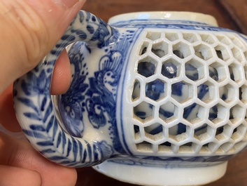A pair of Chinese reticulated and double-walled blue and white teapots, Transitional period