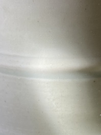 A Chinese celadon-ground blue, white and copper-red rouleau vase, Kangxi