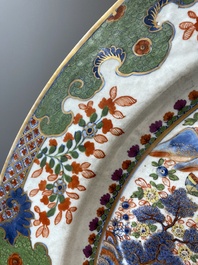 An exceptionally large Chinese English-decorated blue and white dish with 'mythical animals', Qianlong