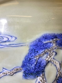 A Chinese celadon-ground blue, white and copper-red rouleau vase, Kangxi