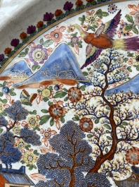 An exceptionally large Chinese English-decorated blue and white dish with 'mythical animals', Qianlong