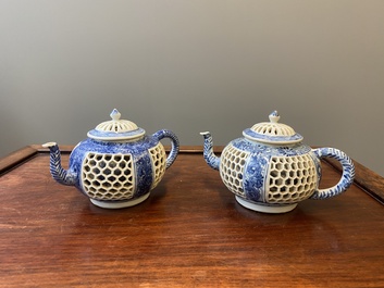 A pair of Chinese reticulated and double-walled blue and white teapots, Transitional period