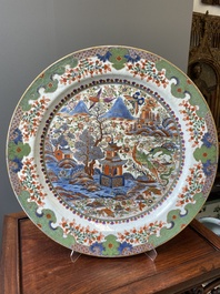 An exceptionally large Chinese English-decorated blue and white dish with 'mythical animals', Qianlong
