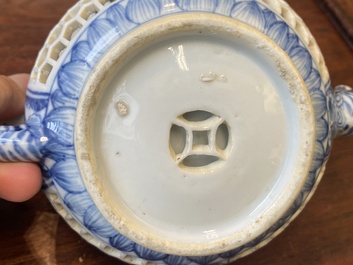 A pair of Chinese reticulated and double-walled blue and white teapots, Transitional period