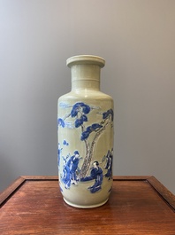 A Chinese celadon-ground blue, white and copper-red rouleau vase, Kangxi